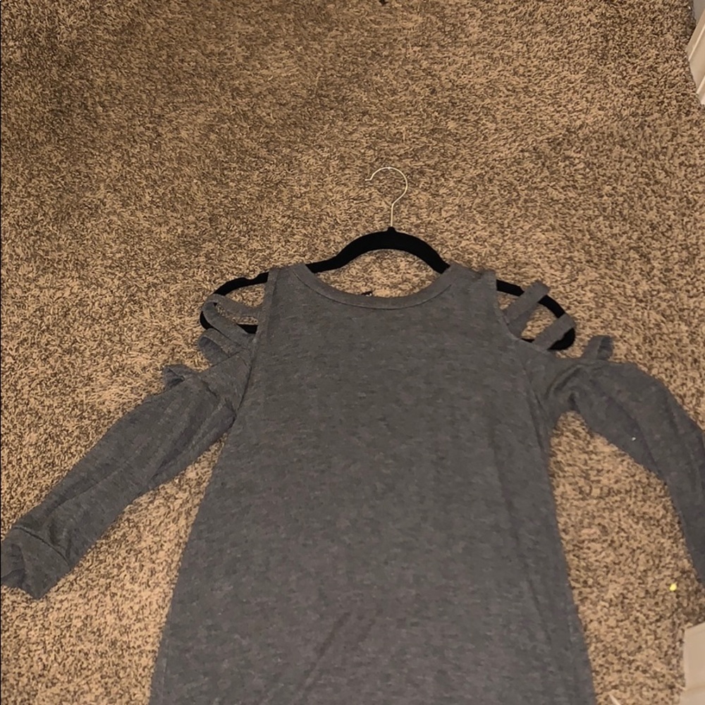 grey long sleeve with slits in shoulder